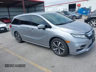 2020 Honda Odyssey Elite with VIN 5FNRL6H9XLB003353, listed as a IAAI auction lot 42620971 with 81,811 mi miles and . Bid and sale history available at DreamBid. Image 1.
