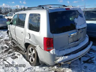 2015 Honda Pilot SE with VIN 5FNYF4H33FB064910, listed as a IAAI auction lot 41357315 with 115,879 mi miles and . Bid and sale history available at DreamBid. Image 3.
