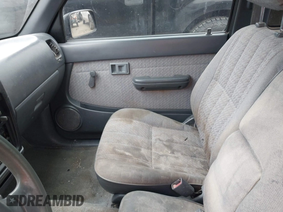 1997 Toyota Tacoma with VIN 4TAVL52N0VZ311543, listed as a IAAI auction lot 41644677 with 292,131 mi miles. Bid and sale history available at carsss.com. Image 5.