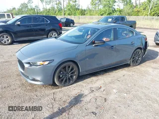 2024 Mazda 3 S Carbon Edition with VIN 3MZBPBCM6RM411828, listed as a IAAI auction lot 42802141 with 40,061 mi miles and . Bid and sale history available at DreamBid. Image 20.