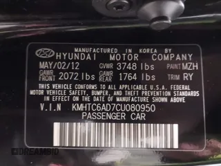 2012 Hyundai Veloster w/Black Int z VIN KMHTC6AD7CU080950, wystawiony jako IAAI lot #41606241 z przebiegiem 86 843 mil mil oraz . Historia ofert i sprzedaży dostępna na DreamBid. Obrazek 9.