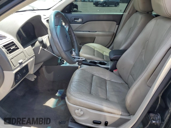 2010 Ford Fusion Hybrid z VIN 3FADP0L33AR185719, wystawiony jako Copart lot #59821115 z przebiegiem 154 019 mil mil oraz Czysty tytuł • Clean title. Historia ofert i sprzedaży dostępna na DreamBid. Obrazek 7.