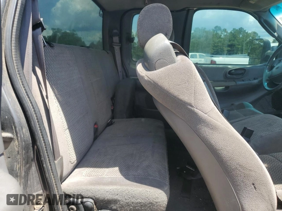 2002 Ford F-150 XL z VIN 1FTRX18L52NB59531, wystawiony jako Copart lot #58550365 z przebiegiem 267 424 mil mil oraz Szkoda całkowita • Salvage title. Historia ofert i sprzedaży dostępna na DreamBid. Obrazek 10.
