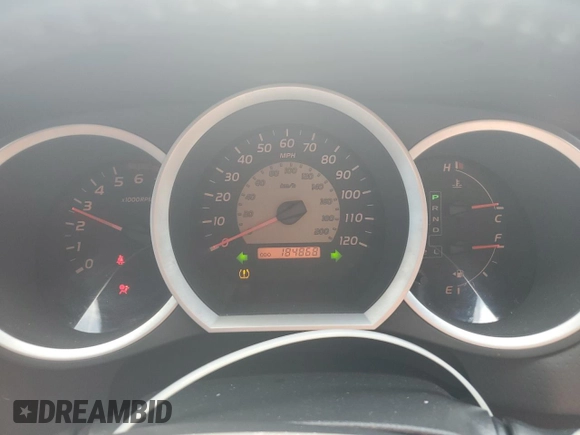2010 Toyota Tacoma PreRunner with VIN 3TMKU4HN1AM025931, listed as a Copart auction lot 54336905 with 184,868 mi miles and Salvage title. Bid and sale history available at DreamBid. Image 9.