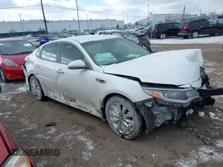 2018 Kia Optima LX z VIN 5XXGT4L37JG190270, wystawiony jako IAAI lot #41269321 z przebiegiem 61 645 mil mil oraz . Historia ofert i sprzedaży dostępna na DreamBid. Obrazek 1.