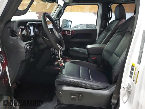 2024 Jeep Wrangler Sahara with VIN 1C4PJXEG8RW354580, listed as a Copart auction lot 64086715 with 11,721 mi miles and Salvage title. Bid and sale history available at DreamBid. Image 7.