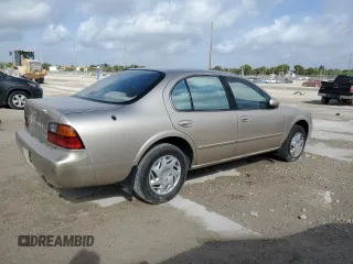 1995 Nissan Maxima GLE с VIN JN1CA21D1ST067119, выставлен на аукционе Copart как лот 53255025 с пробегом 74 851 миль миль и На запчасти • Non repairable. История ставок и продаж доступна на DreamBid. Изображение 3.