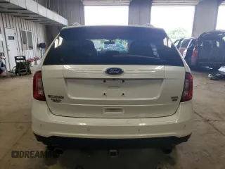 2014 Ford Edge SEL z VIN 2FMDK4JC9EBB53117, wystawiony jako Copart lot #61017115 z przebiegiem 118 071 mil mil oraz Nie do naprawy • Non repairable. Historia ofert i sprzedaży dostępna na DreamBid. Obrazek 6.