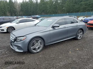 2018 Mercedes-Benz E 300 z VIN WDDZF4KBXJA293547, wystawiony jako Copart lot #51130015 z przebiegiem 54 350 mil mil oraz Szkody całkowita. Historia ofert i sprzedaży dostępna na DreamBid. Obrazek 1.