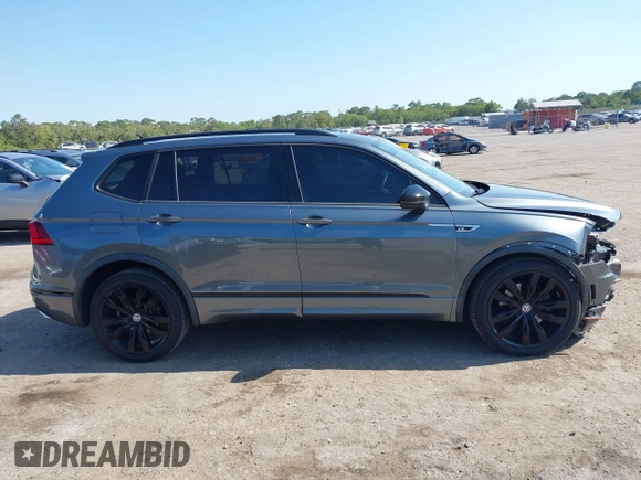 2020 Volkswagen Tiguan SE with VIN 3VV3B7AX3LM176300, listed as a IAAI auction lot 42004744 with 86,074 mi miles and . Bid and sale history available at DreamBid. Image 13.