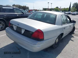 2008 Ford Police Interceptor with VIN 2FAFP71V88X150434, listed as a IAAI auction lot 42283744 with Not provided miles and . Bid and sale history available at DreamBid. Image 4.