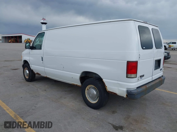 2004 Ford Econoline Cargo with VIN 1FTNE24W84HB38152, listed as a IAAI auction lot 42090193 with 102,357 mi miles. Bid and sale history available at carsss.com. Image 3.