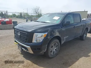 2024 Nissan Titan SV with VIN 1N6AA1EC6RN110607, listed as a IAAI auction lot 42167410 with 25,726 mi miles and . Bid and sale history available at DreamBid. Image 2.