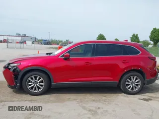 2016 Mazda CX-9 Touring with VIN JM3TCACY4G0112961, listed as a IAAI auction lot 42094718 with 114,679 mi miles and . Bid and sale history available at DreamBid. Image 14.