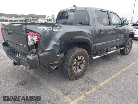 2018 Toyota Tacoma SR5 with VIN 3TMAZ5CN1JM071396, listed as a IAAI auction lot 42061640 with 122,148 mi miles and . Bid and sale history available at DreamBid. Image 4.