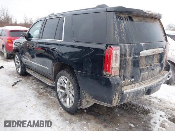 2020 GMC Yukon Denali with VIN 1GKS2CKJ5LR301216, listed as a IAAI auction lot 41439076 with 76,129 mi miles. Bid and sale history available at carsss.com. Image 3.