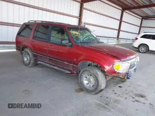 1999 Mercury Mountaineer z VIN 4M2DU55P5XUJ31186, wystawiony jako IAAI lot #42021103 z przebiegiem 141 887 mil mil oraz . Historia ofert i sprzedaży dostępna na DreamBid. Obrazek 1.