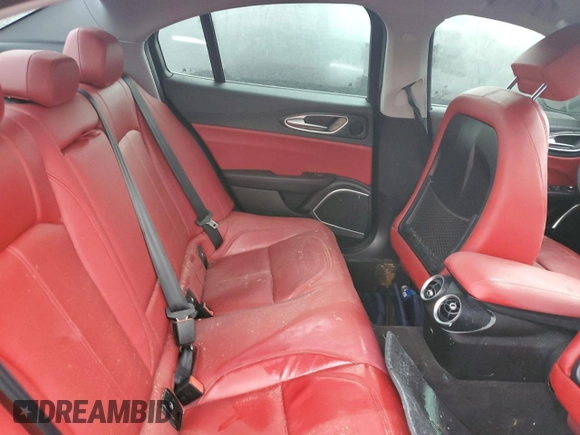 2019 Alfa Romeo Giulia z VIN ZARFAMAN4K7622772, wystawiony jako Copart lot #55380795 z przebiegiem Nie podano mil oraz Szkody całkowita. Historia ofert i sprzedaży dostępna na DreamBid. Obrazek 10.