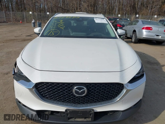 2022 Mazda CX-30 S Premium with VIN 3MVDMBDL7NM412263, listed as a IAAI auction lot 41779877 with 42,088 mi miles and . Bid and sale history available at carsss.com. Image 11.