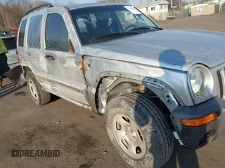 2004 Jeep Liberty Sport with VIN 1J4GK48K34W101682, listed as a IAAI auction lot 41724084 with 58,784 mi miles and . Bid and sale history available at DreamBid. Image 6.