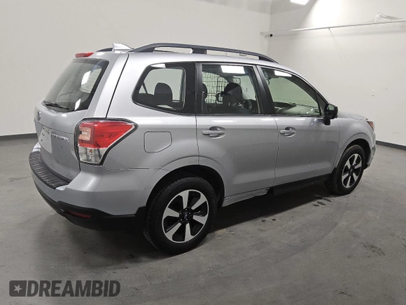 2018 Subaru Forester z VIN JF2SJABC4JH617909, wystawiony jako Copart lot #54871405 z przebiegiem 167 151 mil mil oraz Czysty tytuł • Clean title. Historia ofert i sprzedaży dostępna na DreamBid. Obrazek 3.