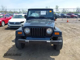 2006 Jeep Wrangler Sport with VIN 1J4FA49S76P718349, listed as a IAAI auction lot 42098356 with 137,804 mi miles and . Bid and sale history available at carsss.com. Image 12.