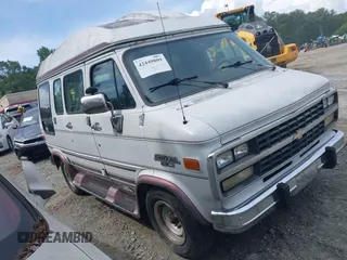 1995 Chevrolet Chevy Van z VIN 1GBEG25H2SF139482, wystawiony jako IAAI lot #42449809 z przebiegiem 143 172 mil mil oraz . Historia ofert i sprzedaży dostępna na DreamBid. Obrazek 1.