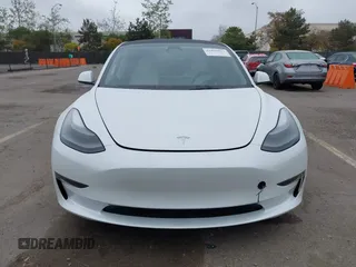 2023 Tesla Model 3 with VIN 5YJ3E1EA5PF505856, listed as a IAAI auction lot 41885837 with 28,206 mi miles and . Bid and sale history available at carsss.com. Image 11.