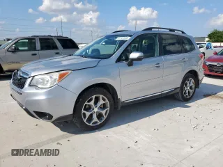 2015 Subaru Forester Touring with VIN JF2SJAWC0FH529845, listed as a Copart auction lot 61147525 with 75,686 mi miles and Salvage title. Bid and sale history available at DreamBid. Image 1.