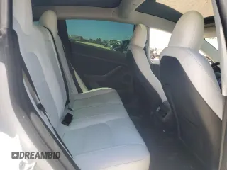 2023 Tesla Model 3 z VIN 5YJ3E1EA7PF549633, wystawiony jako Copart lot #57131325 z przebiegiem 78 113 mil mil oraz Szkoda całkowita • Salvage title. Historia ofert i sprzedaży dostępna na DreamBid. Obrazek 10.