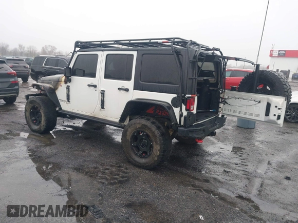 2016 Jeep Wrangler Unlimited Rubicon with VIN 1C4BJWFGXGL185227, listed as a IAAI auction lot 41555159 with 1 mi miles. Bid and sale history available at carsss.com. Image 3.