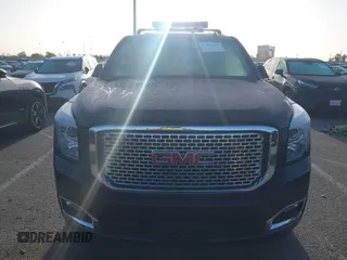 2015 GMC Yukon Denali z VIN 1GKS1CKJ7FR566419, wystawiony jako IAAI lot #41948825 z przebiegiem 235 037 mil mil oraz . Historia ofert i sprzedaży dostępna na DreamBid. Obrazek 12.