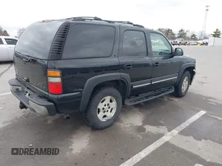 2005 Chevrolet Tahoe LS with VIN 1GNEK13TX5J179510, listed as a IAAI auction lot 41833007 with 192,402 mi miles. Bid and sale history available at carsss.com. Image 4.