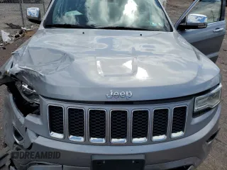 2015 Jeep Grand Cherokee Overland with VIN 1C4RJFCG3FC880084, listed as a Copart auction lot 57291165 with 112,442 mi miles and Salvage title. Bid and sale history available at DreamBid. Image 12.