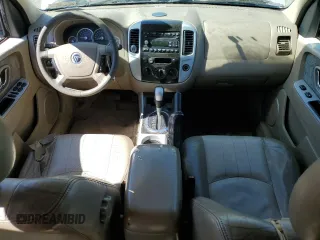 2007 Mercury Mariner Luxury with VIN 4M2YU91147KJ04454, listed as a Copart auction lot 49666005 with 198,627 mi miles and Salvage title. Bid and sale history available at DreamBid. Image 8.