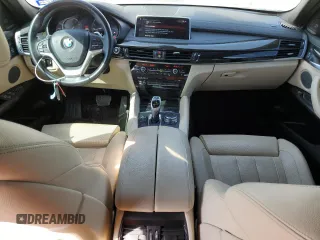 2018 BMW X6 sDrive35i with VIN 5UXKU0C5XJ0G69741, listed as a Copart auction lot 77366934 with 66,287 mi miles and Salvage Title. Bid and sale history available at carsss.com. Image 8.