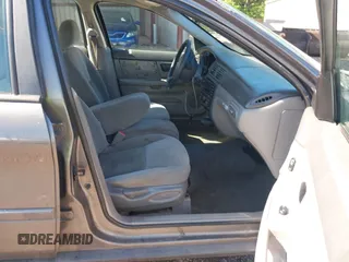 2005 Ford Taurus SE with VIN 1FAFP532X5A272398, listed as a IAAI auction lot 42001798 with 159,199 mi miles. Bid and sale history available at carsss.com. Image 5.