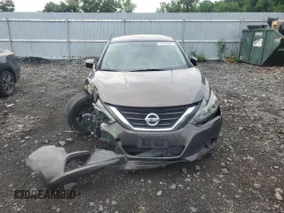 2017 Nissan Altima SV with VIN 1N4AL3AP0HC124410, listed as a Copart auction lot 62741545 with 106,834 mi miles and Salvage title. Bid and sale history available at DreamBid. Image 5.