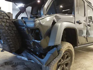 2021 Jeep Wrangler Unlimited Sport S with VIN 1C4HJXDN8MW744768, listed as a IAAI auction lot 41894327 with 47,826 mi miles and . Bid and sale history available at DreamBid. Image 6.