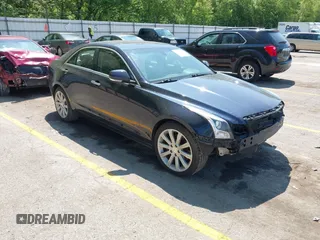 2016 Cadillac ATS Luxury Collection AWD z VIN 1G6AH5RX3G0101444, wystawiony jako IAAI lot #42264963 z przebiegiem 87 438 mil mil oraz . Historia ofert i sprzedaży dostępna na DreamBid. Obrazek 1.