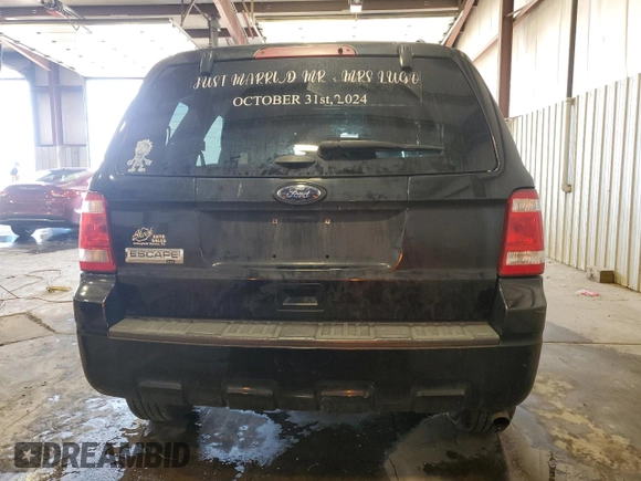 2012 Ford Escape XLT with VIN 1FMCU9D71CKC27621, listed as a Copart auction lot 62741115 with 128,254 mi miles and Salvage title. Bid and sale history available at DreamBid. Image 6.