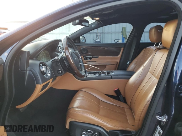 2015 Jaguar XJ with VIN SAJWA2GT2FMV90837, listed as a Copart auction lot 71126294 with 92,973 mi miles and Clean Title. Bid and sale history available at DreamBid. Image 7.