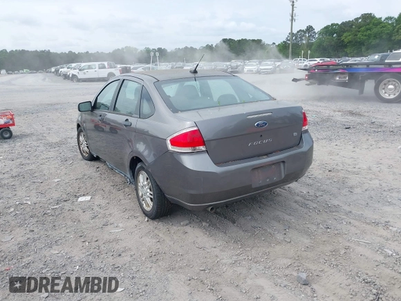 2009 Ford Focus SE with VIN 1FAHP35N49W178711, listed as a IAAI auction lot 42084721 with 203,889 mi miles. Bid and sale history available at carsss.com. Image 3.