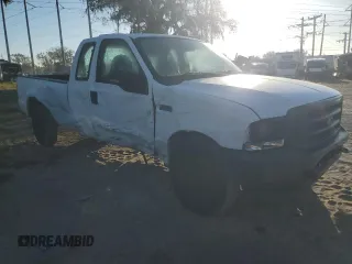 2003 Ford F-250 XL with VIN 1FTNX20L73EC70163, listed as a Copart auction lot 77061204 with 387,321 mi miles and Salvage title. Bid and sale history available at DreamBid. Image 4.