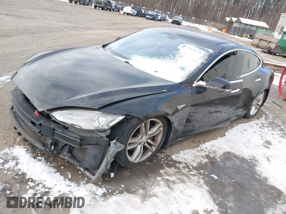 2013 Tesla Model S с VIN 5YJSA1AG2DFP11228, выставлен на аукционе IAAI как лот 41339370 с пробегом 121 237 миль миль и . История ставок и продаж доступна на DreamBid. Изображение 2.