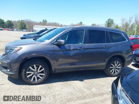 2021 Honda Pilot EX-L with VIN 5FNYF6H59MB016354, listed as a IAAI auction lot 42108020 with 61,436 mi miles and . Bid and sale history available at DreamBid. Image 15.