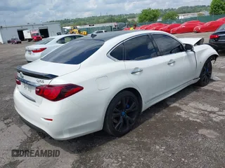 2018 Infiniti Q70 Luxe z VIN JN1BY1AR4JM220503, wystawiony jako IAAI lot #42208973 z przebiegiem 70 720 mil mil oraz . Historia ofert i sprzedaży dostępna na DreamBid. Obrazek 4.