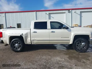 2014 Chevrolet Silverado 1500 LTZ with VIN 3GCUKSEC5EG165684, listed as a IAAI auction lot 41114072 with 133,423 mi miles. Bid and sale history available at carsss.com. Image 13.