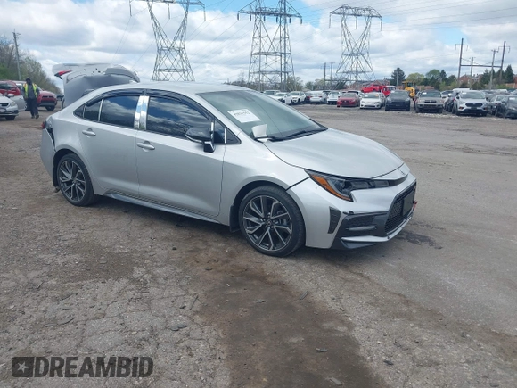 2021 Toyota Corolla SE with VIN 5YFS4MCE2MP066802, listed as a IAAI auction lot 42031552 with 34,075 mi miles. Bid and sale history available at carsss.com. Image 1.