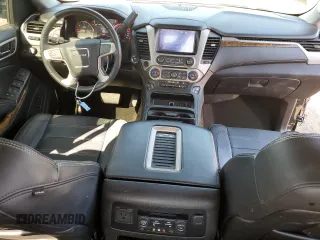 2016 GMC Yukon Denali with VIN 1GKS2CKJ9GR301628, listed as a Copart auction lot 48937035 with 121,863 mi miles and Salvage Title. Bid and sale history available at carsss.com. Image 8.